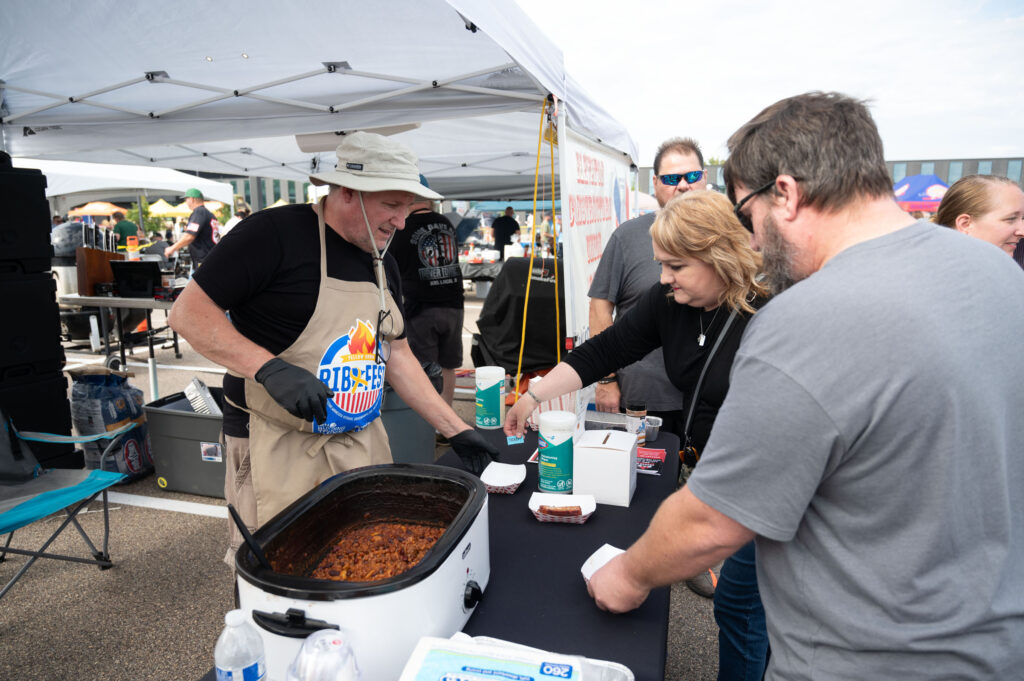 More than 600 people feasted on 437 racks of ribs cooked at Minnesota Building Trades RibFest, an event that raises money for the Minnesota Building Trades Beyond the Yellow Ribbon Committee.