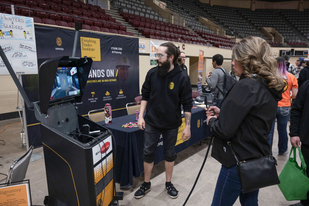 Adults get their chance to sample the same hands-on activities and discuss opportunities the union building trades provide during an evening version of Construct Tomorrow at Fitzgerald Hall in the Duluth Entertainment Convention Center (DECC).